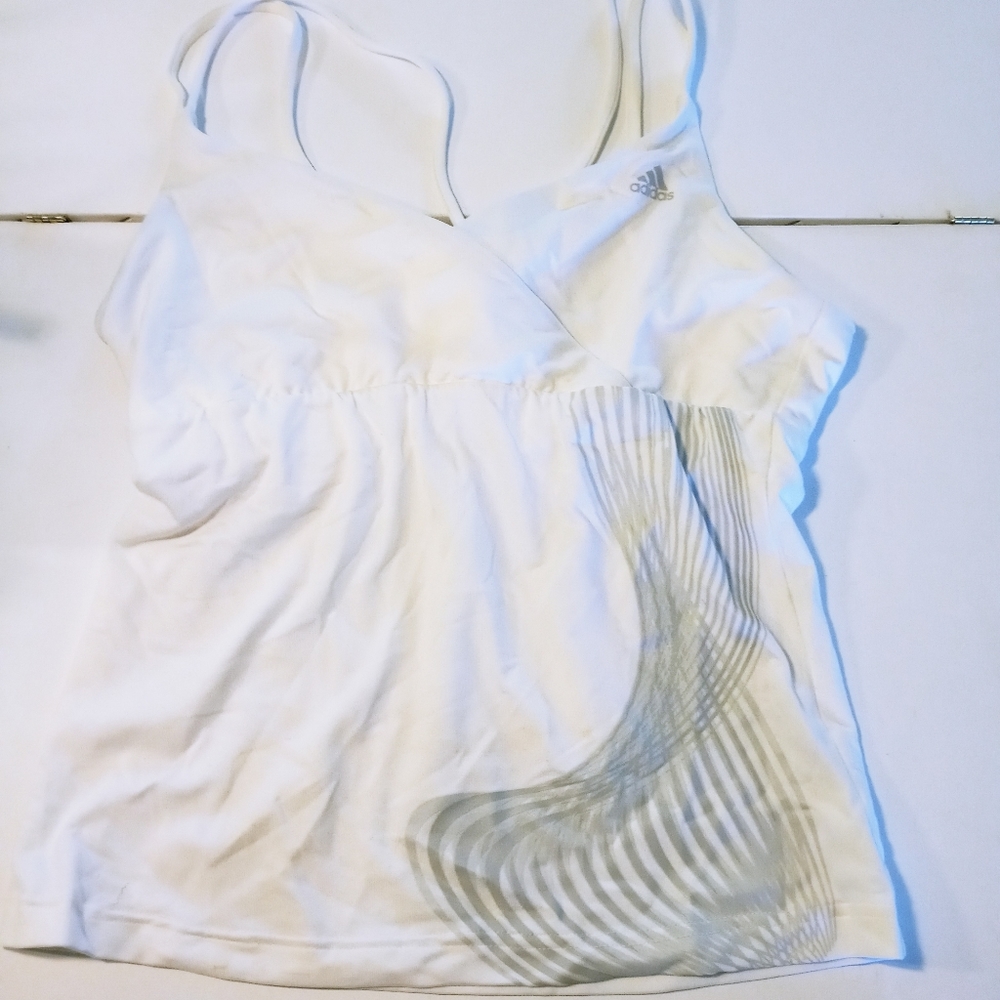 *Women's Adidas Climalite Running top. B36-328